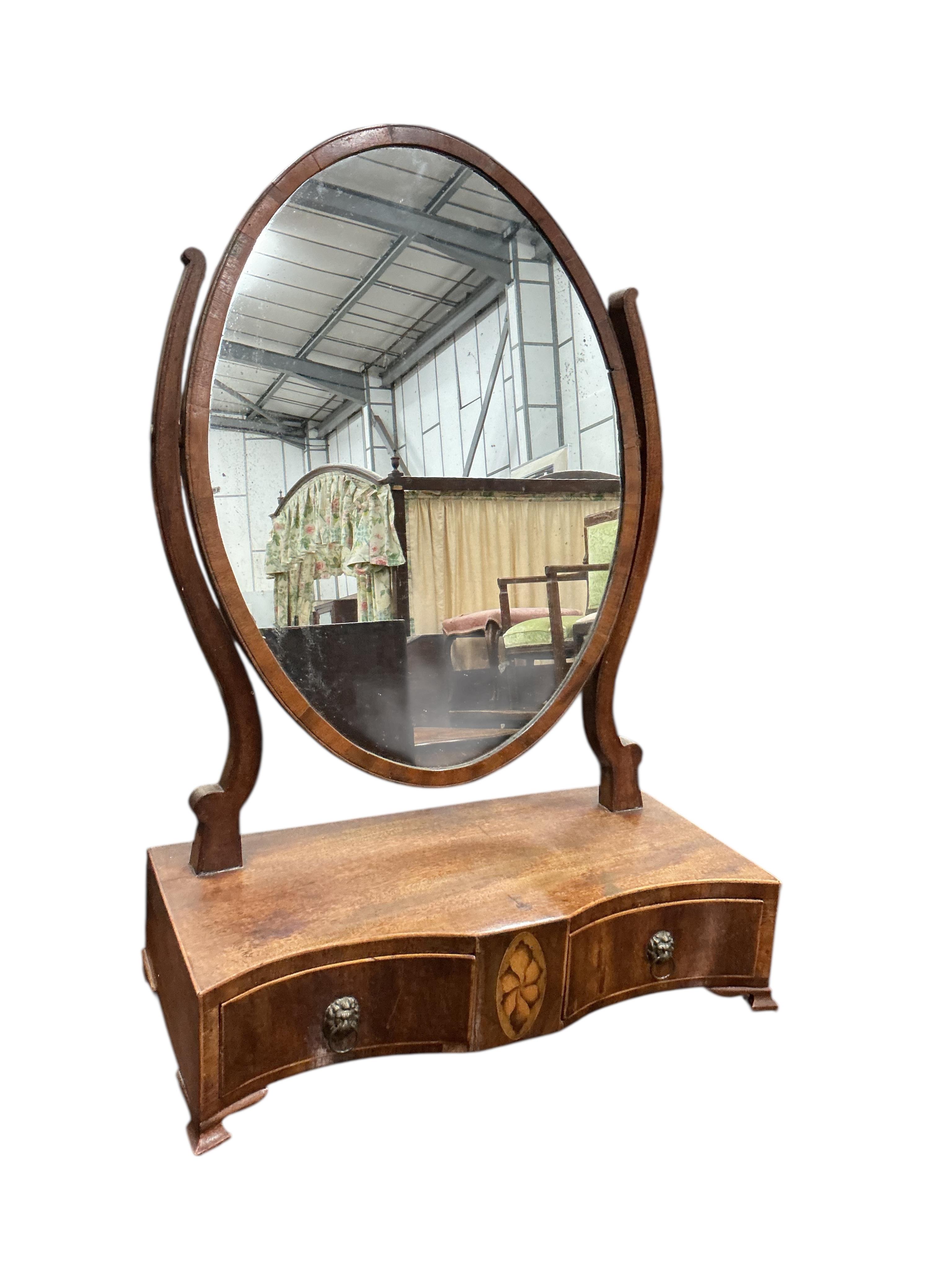 A George III toilet mirror in oval boxwood inlaid mahogany frame and one other, larger width 45cm, height 56cm
